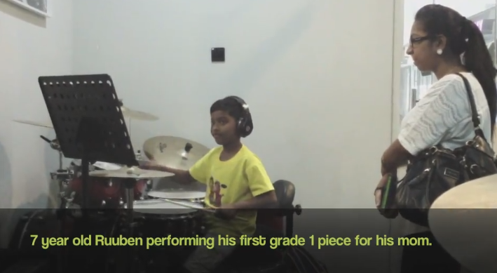 Ruuben plays his first grade 1